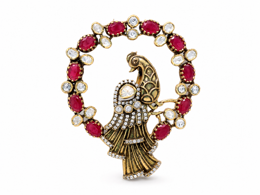 Gold-plated 925 sterling silver peacock brooch with ruby-inspired stones, Polki detailing and zircon accents in a traditional unisex royal design.