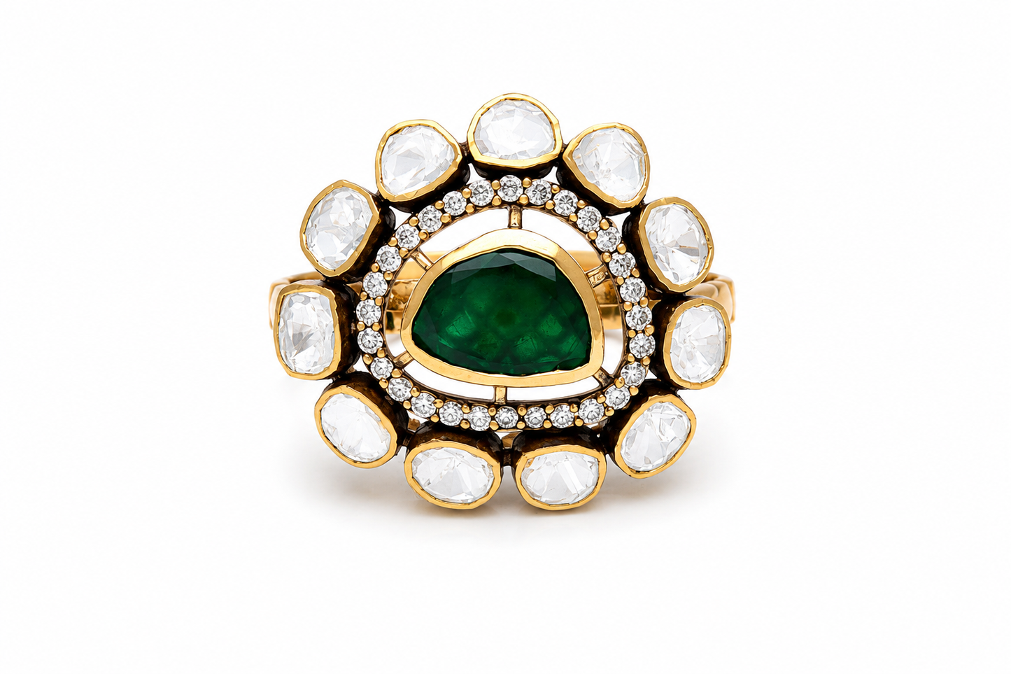 Gold-plated 925 sterling silver statement ring with pear-shaped emerald centre, Polki stones and zircon halo in traditional Indian floral design.