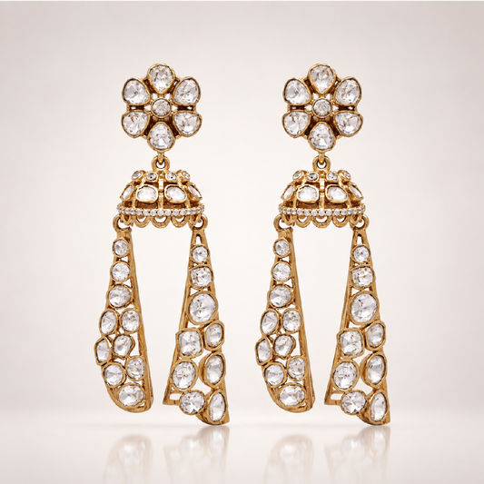 Gold-toned jhumka earrings with long stone-encrusted drops