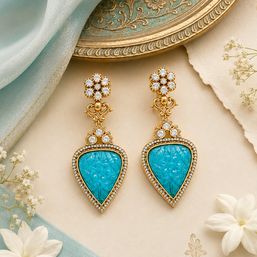 Statement turquoise earrings with carved gemstone and stone accents