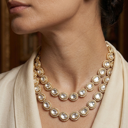 Elegant layered necklace featuring clear stones and gold detailing