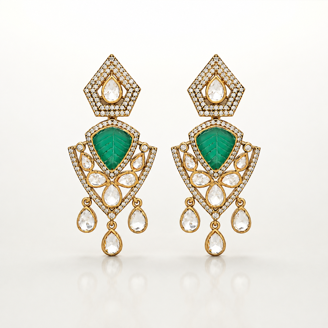 Gold-toned necklace with green gemstones and white stone detailing