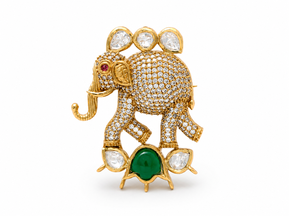 Gajendra elephant brooch with white and colored stones in gold finish
