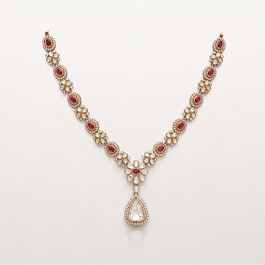 Ruby and white stone necklace with floral detailing and teardrop pendant