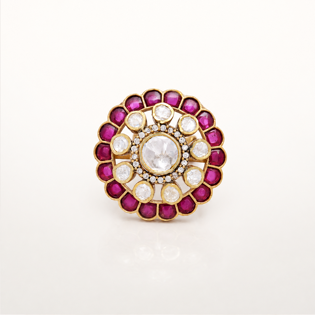 Gulrukh pink coloured stone ring with white centre stone and floral design