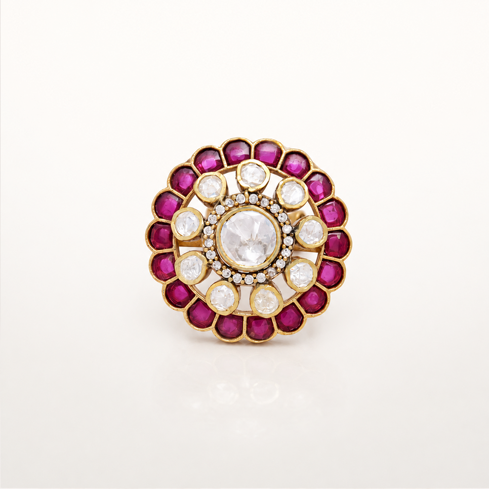 Gulrukh pink coloured stone ring with white centre stone and floral design