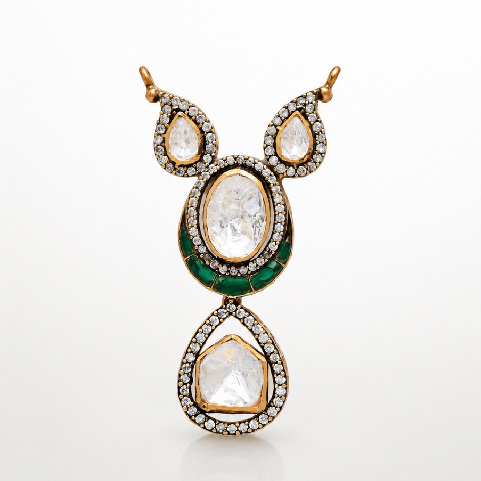 Haritara gold-toned pendant with layered teardrop design and green accents