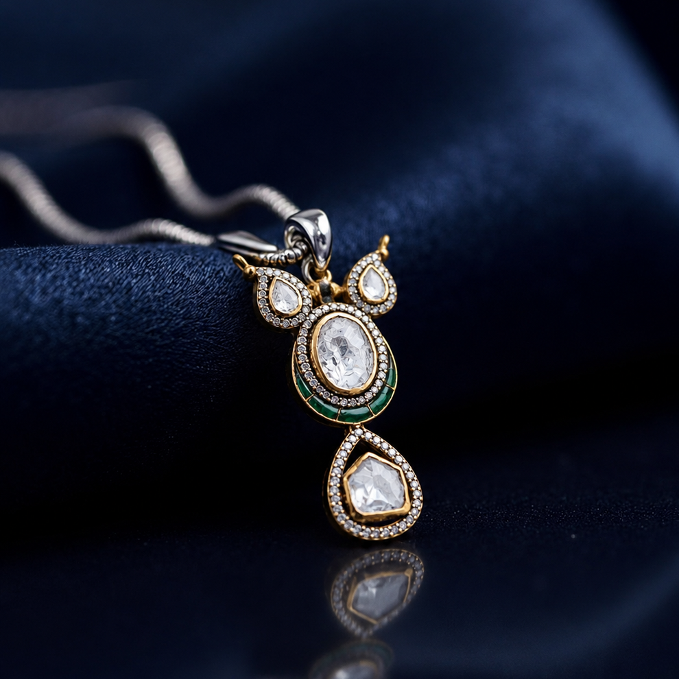 Side view of Haritara heritage pendant showing layered gold-toned setting