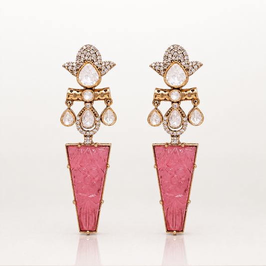 Iravati gold tone statement earrings with carved pink gemstone drops