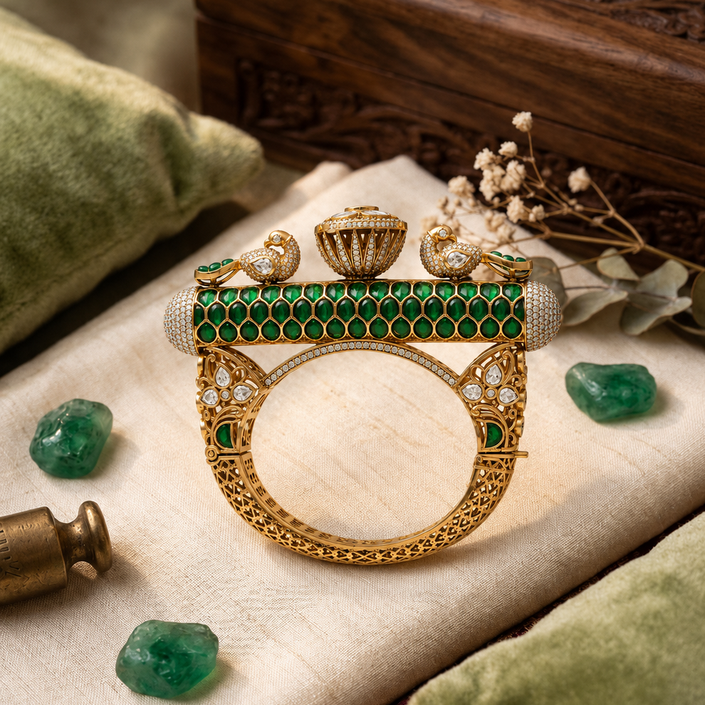 Side angle of gold plated 925 silver Mayur Rajsi kada featuring emerald cabochons, Polki centerpiece, peacock motifs, and traditional handcrafted detailing