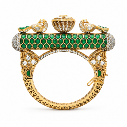 Gold plated 925 silver Mayur Rajsi kada with emerald green stones, Polki detailing, peacock motifs, and intricate handcrafted heritage design.