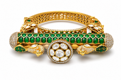 Gold plated 925 silver Mayur Rajsi kada with emerald green stones, Polki detailing, peacock motifs, and intricate handcrafted heritage design.