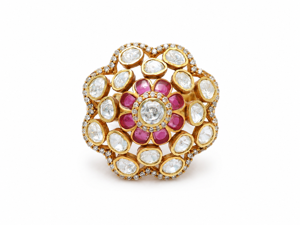 Gold plated 925 silver Padmika Polki ring featuring a lotus-inspired floral design with uncut Polki stones, ruby-colored petals, and handcrafted traditional detailing.
