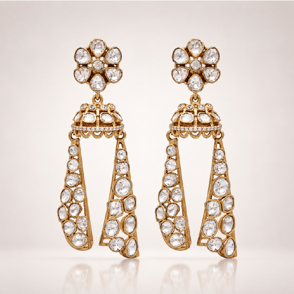 Gold-toned jhumka earrings with long stone-encrusted drops