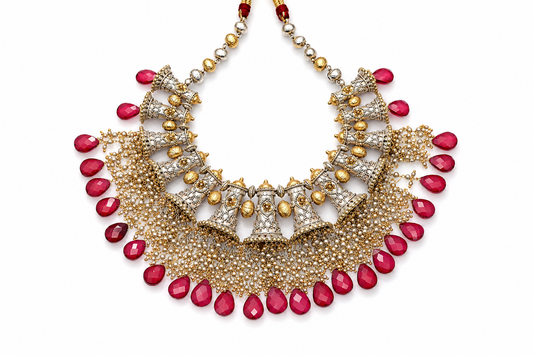 Traditional heritage necklace with red stone drops, pearl detailing and gold silver finish