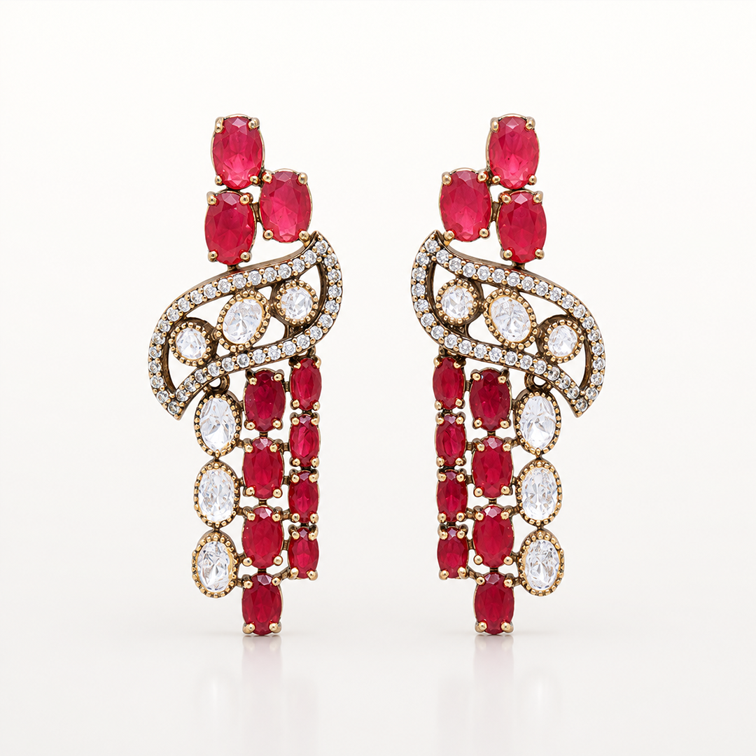 Rangdhara matching earrings with red gemstones and white stone detailing