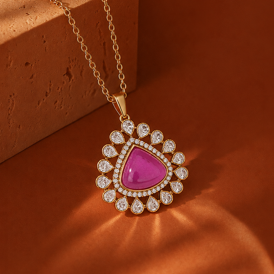 AUTAARA Gulnaar teardrop pendant with pink centre stone and white stone halo