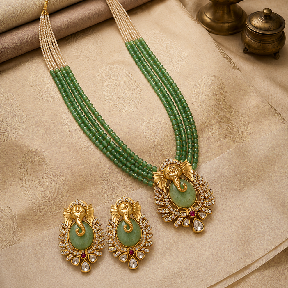 Varnika Ganesha necklace set with multi-strand green beads and coloured stones